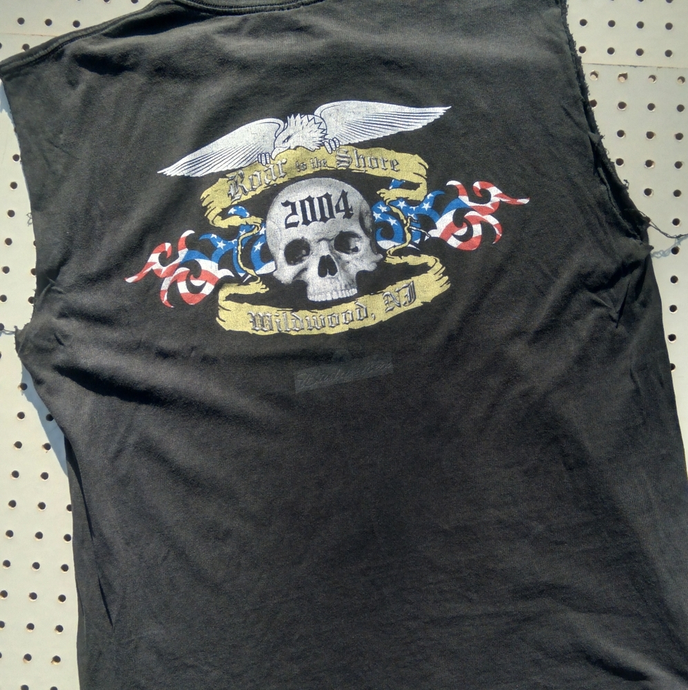 Very distressed sleeveless Harley Davidson tshirt